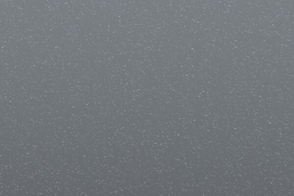 Chevrolet Tahoe 2023, SUV con 3 filas de asientos en color gris tiburon