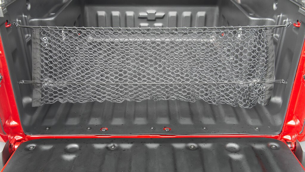 Organiza tu caja de carga con la red vertical para Chevrolet Montana 2024